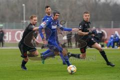 3. Liga - Testspiel - FC Ingolstadt 04 - Karlsruher SC - Kampf um den Ball Maximilian Beister (10, FCI) Damian Roßbach (KSC) und Filip Bilbija (35, FCI)