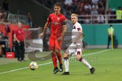 DFB Pokal - Fußball - FC Ingolstadt 04 - 1. FC Nürnberg - Stefan Kutschke (30, FCI) Kerk Sebastian (1. FCN, 10)