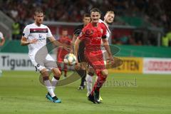 DFB Pokal - Fußball - FC Ingolstadt 04 - 1. FC Nürnberg - Stefan Kutschke (30, FCI) links Sörensen Asger (1. FCN, 4)