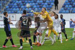 3. Liga - Waldhof Mannheim - FC Ingolstadt 04 - Torwart Bartels Jan-Christoph (23 Mannheim) boxt den Ball vor Björn Paulsen (4, FCI) und Stefan Kutschke (30, FCI) Caniggia Ginola Elva (14, FCI) weg