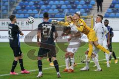 3. Liga - Waldhof Mannheim - FC Ingolstadt 04 - Torwart Bartels Jan-Christoph (23 Mannheim) boxt den Ball vor Björn Paulsen (4, FCI) und Stefan Kutschke (30, FCI) Caniggia Ginola Elva (14, FCI) weg