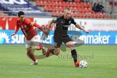 3. Liga - Hallescher FC - FC Ingolstadt 04 - Ilmari Niskanen (22, FCI) links Landgraf Niklas (31 Halle)