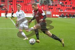 3. Fußball-Liga - Saison 2020/2021 - FC Ingolstadt 04 - SpVgg Unterhaching - Marcel Gaus (#19,FCI) - Luca Marseiler (#30 Unterhaching) - Foto: Meyer Jürgen