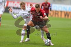 3. Fußball-Liga - Saison 2020/2021 - FC Ingolstadt 04 - SpVgg Unterhaching - Gordon Büch (#18,FCI) - Luca Marseiler (#30 Unterhaching) - Foto: Meyer Jürgen