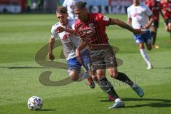 3. Fußball-Liga - Saison 2020/2021 - FC Ingolstadt 04 -  KFC Uerdingen - Justin Butler (#31,FCI) - Gino Fechner (#16 Uerdingen) - Foto: Meyer Jürgen