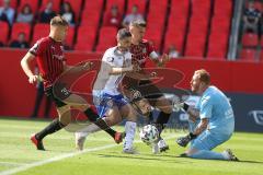 3. Fußball-Liga - Saison 2020/2021 - FC Ingolstadt 04 -  KFC Uerdingen - Stefan Kutschke (#30,FCI)  - Stefan Velkow (#13 Uerdingen) - Filip Bilbija (#35,FCI)  - Lukas Königshofer Torwart (#1 Uerdingen) - Foto: Meyer Jürgen