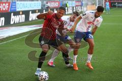 3. Fußball-Liga - Saison 2020/2021 - FC Ingolstadt 04 -  KFC Uerdingen - Justin Butler (#31,FCI) - Gino Fechner (#16 Uerdingen) - Foto: Meyer Jürgen