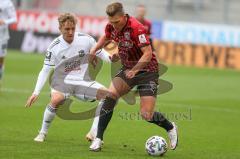 3. Fußball-Liga - Saison 2020/2021 - FC Ingolstadt 04 - SpVgg Unterhaching - Gordon Büch (#18,FCI) - Luca Marseiler (#30 Unterhaching) - Foto: Meyer Jürgen