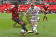 3. Fußball-Liga - Saison 2020/2021 - FC Ingolstadt 04 - SC Verl - Ganiggia Ginola Elva (#14,FCI)  - Lars Ritzka (#21 Verl) - Foto: Meyer Jürgen