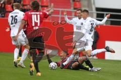 3. Fußball-Liga - Saison 2020/2021 - FC Ingolstadt 04 - SpVgg Unterhaching - Justin Butler (#31,FCI) wird im Strafraum gefoult - Christoph Greger (#15 Unterhaching) - Foto: Meyer Jürgen