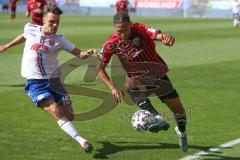 3. Fußball-Liga - Saison 2020/2021 - FC Ingolstadt 04 -  KFC Uerdingen - Justin Butler (#31,FCI) - Gino Fechner (#16 Uerdingen) - Foto: Meyer Jürgen