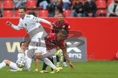 3. Fußball-Liga - Saison 2020/2021 - FC Ingolstadt 04 - SpVgg Unterhaching - Ganiggia Ginola Elva (#14,FCI)  - Robert Müller (#4 Unterhaching) - Foto: Meyer Jürgen