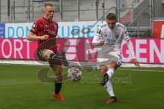 3. Fußball-Liga - Saison 2020/2021 - FC Ingolstadt 04 - SpVgg Unterhaching - IImari Niskanen (#22,FCI) - Christoph Greger (#15 Unterhaching) - Foto: Meyer Jürgen