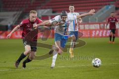 3. Liga - FC Ingolstadt 04 - F.C. Hansa Rostock - Zweikmapf Ilmari Niskanen (22, FCI) Damian Roßbach (4 Rostock)