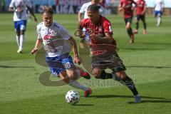 3. Fußball-Liga - Saison 2020/2021 - FC Ingolstadt 04 -  KFC Uerdingen - Justin Butler (#31,FCI) - Gino Fechner (#16 Uerdingen) - Foto: Meyer Jürgen