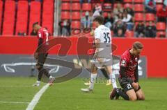 3. Fußball-Liga - Saison 2020/2021 - FC Ingolstadt 04 - SpVgg Unterhaching - Enttäuschte Gesichter nach dem Spiel - Tobias Schröck (#21,FCI)  - Justin Butler (#31,FCI) - Foto: Meyer Jürgen