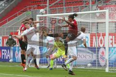 3. Fußball-Liga - Saison 2020/2021 - FC Ingolstadt 04 - SC Verl - Ganiggia Ginola Elva (#14,FCI)  - Björn Paulsen (#4,FCI)  beim Kopfball - Robin Brüseke Torwart (#32 Verl) - Foto: Meyer Jürgen