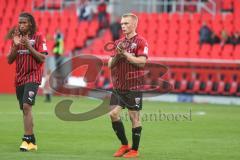 3. Fußball-Liga - Saison 2020/2021 - FC Ingolstadt 04 - SpVgg Unterhaching - Die Spieler bedanken sich bei den Fans - IImari Niskanen (#22,FCI) - Ganiggia Ginola Elva (#14,FCI)  - Foto: Meyer Jürgen