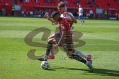 3. Fußball-Liga - Saison 2020/2021 - FC Ingolstadt 04 -  KFC Uerdingen - Justin Butler (#31,FCI) - Gino Fechner (#16 Uerdingen) - Foto: Meyer Jürgen