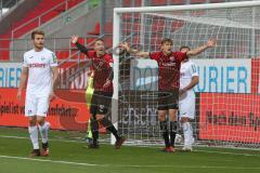 3. Fußball-Liga - Saison 2020/2021 - FC Ingolstadt 04 - SC Verl - Tobias Schröck (#21,FCI)  und Filip Bilbija (#35,FCI)  reklamieren ein Handspiel - Foto: Meyer Jürgen