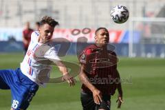 3. Fußball-Liga - Saison 2020/2021 - FC Ingolstadt 04 -  KFC Uerdingen - Justin Butler (#31,FCI) - Gino Fechner (#16 Uerdingen) - Foto: Meyer Jürgen