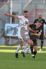 3. Fußball-Liga - Saison 2020/2021 - Testspiel -FC Ingolstadt 04 - 1. FC Heidenheim - Kraus Tim (#26,FCI) - Denis Thomalla (#11 Heidenheim) - Foto: Meyer Jürgen