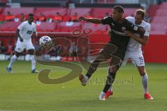 3. Fußball-Liga - Saison 2020/2021 - Testspiel -FC Ingolstadt 04 - 1. FC Heidenheim - Justin Butler (#31,FCI) - Jonas Föhrenbach (#19 Heidenheim) - Foto: Meyer Jürgen