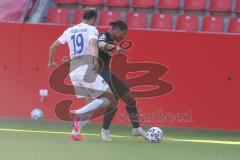 3. Fußball-Liga - Saison 2020/2021 - Testspiel -FC Ingolstadt 04 - 1. FC Heidenheim - Justin Butler (#31,FCI) - Jonas Föhrenbach (#19 Heidenheim) - Foto: Meyer Jürgen