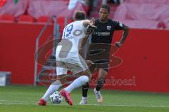 3. Fußball-Liga - Saison 2020/2021 - Testspiel -FC Ingolstadt 04 - 1. FC Heidenheim - Justin Butler (#31,FCI) - Jonas Föhrenbach (#19 Heidenheim) - Foto: Meyer Jürgen