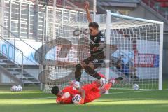 3. Fußball-Liga - Saison 2020/2021 - Testspiel -FC Ingolstadt 04 - 1. FC Heidenheim - Dennis Eckert Ayensa (#7,FCI)  - Kevin Ibrahim Torwart (#39 Heidenheim) - Foto: Meyer Jürgen