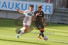 3. Fußball-Liga - Saison 2020/2021 - Testspiel -FC Ingolstadt 04 - 1. FC Heidenheim - Jalen Hawkins (#20,FCI)  - Gianni Mollo (#38 Heidenheim) - Foto: Meyer Jürgen