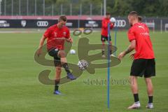 3. Fußball-Liga - Saison 2020/2021 - FC Ingolstadt 04 - Trainingsauftakt - Gordon Büch (#18,FCI) - Maximilian Wolfram (#8,FCI)  - Foto: Meyer Jürgen