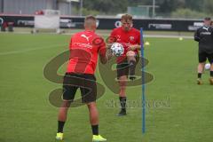 3. Fußball-Liga - Saison 2020/2021 - FC Ingolstadt 04 - Trainingsauftakt - Thorsten Röcher FCI links mit Fabio Meikis FCI - Foto: Meyer Jürgen