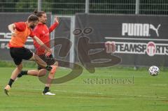 3. Liga - FC Ingolstadt 04 - Training - Rico Preisinger (6, FCI) Schuß und Jonatan Kotzke (25 FCI) stört