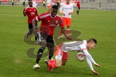 Regionalliga - FC Ingolstadt 04 II - Bayern München II  - Ikeng Jose Alex foult seinen Gegenspieler - Foto: Jürgen Meyer