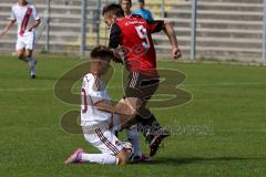 Regionlliga - FC Ingolstadt 04 II - FC Nürnberg -Reisner Dominik #9 rot FC Ing 04 -  Knezevic Ivan #40 weiss Nürnberg links - Foto: Jürgen Meyer