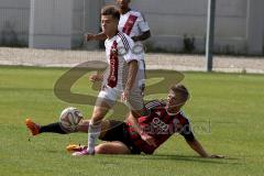 Regionlliga - FC Ingolstadt 04 II - FC Nürnberg -  Knezevic Ivan #40 weiss Nürnberg links - Büch Gordon #2 rot FC Ing 04 - Foto: Jürgen Meyer