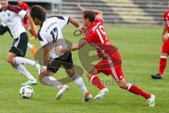 Regionalliga - Saison 2016/2017 - FC Ingolstadt 04 II - FC Bayern München II - Ryoma Watanabe rechts weiss FCI wird von Hingerl Marco Bayern München II gehalten -  Foto: Jürgen Meyer