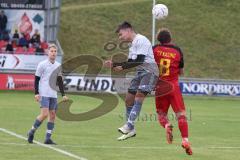 2023_11_5 - SV Kasing - TV Münchsmünster - Kreisliga - Saison 2023/24 - Andre Bräuning grau Münchsmünster - Tobias Wolfsfellner rot Kasing -  Foto: Meyer Jürgen