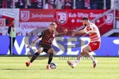 3. Liga; SSV Jahn Regensburg - FC Ingolstadt 04; Zweikampf Kampf um den Ball Max Dittgen (10, FCI) Bulic Rasim (5 Jahn)