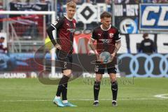 2. Fußball-Liga - Saison 2021/2022 - FC Ingolstadt 04 - Hamburger SV - Florian Pick (#26 FCI) - Andreas Poulsen (#2 FCI) - Foto: Meyer Jürgen