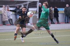 Freundschaftsspiel - FC Fatih Ingolstadt - TV Aiglsbach - Akif Abasikeles schwarz FC Fatih - Paul Helten grün Aiglsbach - Foto: Meyer Jürgen