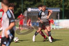 Testspiel - Bezirksliga - Saison 2025/26 - TSV Ober./Unterhaunstadt - Türkisch Ingolstadt  - Baha Asici rot Türkisch  - Florian Diegel weiss Ober./Unterh.stadt - Foto: Meyer Jürgen