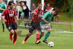 Kreisliga - TSV Baar Ebenhausen - FC Geisenfeld - Fahd Imakor #9 rot Ebenhausen - Lukas Kellermann #4 grün Geisenfeld -  Foto: Jürgen Meyer