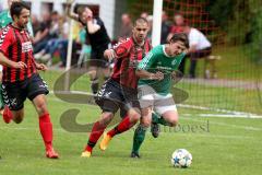 Kreisliga - TSV Baar Ebenhausen - FC Geisenfeld - Fahd Imakor #9 rot Ebenhausen - Lukas Kellermann #4 grün Geisenfeld -  Foto: Jürgen Meyer