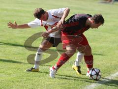 Türkisch SV Ingolstadt - BC Attaching - Sihan Albayrak im Zweikampf