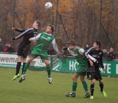 BOL - FC Gerolfing - SV Manching - links FCG Daniel Schachtner köpft mit Manual Mayer, rechts Michael Raab mit Patrick Mack