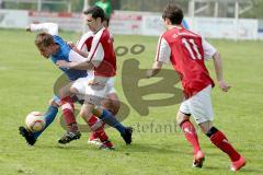 Kreisliga - TSV Ober/Unterhaunstadt - FC Sandersdorf - Kobold Maximilian (blau Ober/Unterh.) setzt sich durch - Foto: Jürgen Meyer