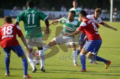 Testspiel - Greuther Fürth - Unterhaching - mitte Tayfun Pektürk  und links Gerald Asamoah im Kampf um den Ball