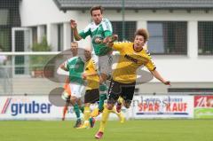 Landesliga Südost - FC Gerolfing - SV Kirchanschöring - Marco Bertic 8 (FCG) links gewinnt das Kopfballduell - Fotograf: Marek Kowalski